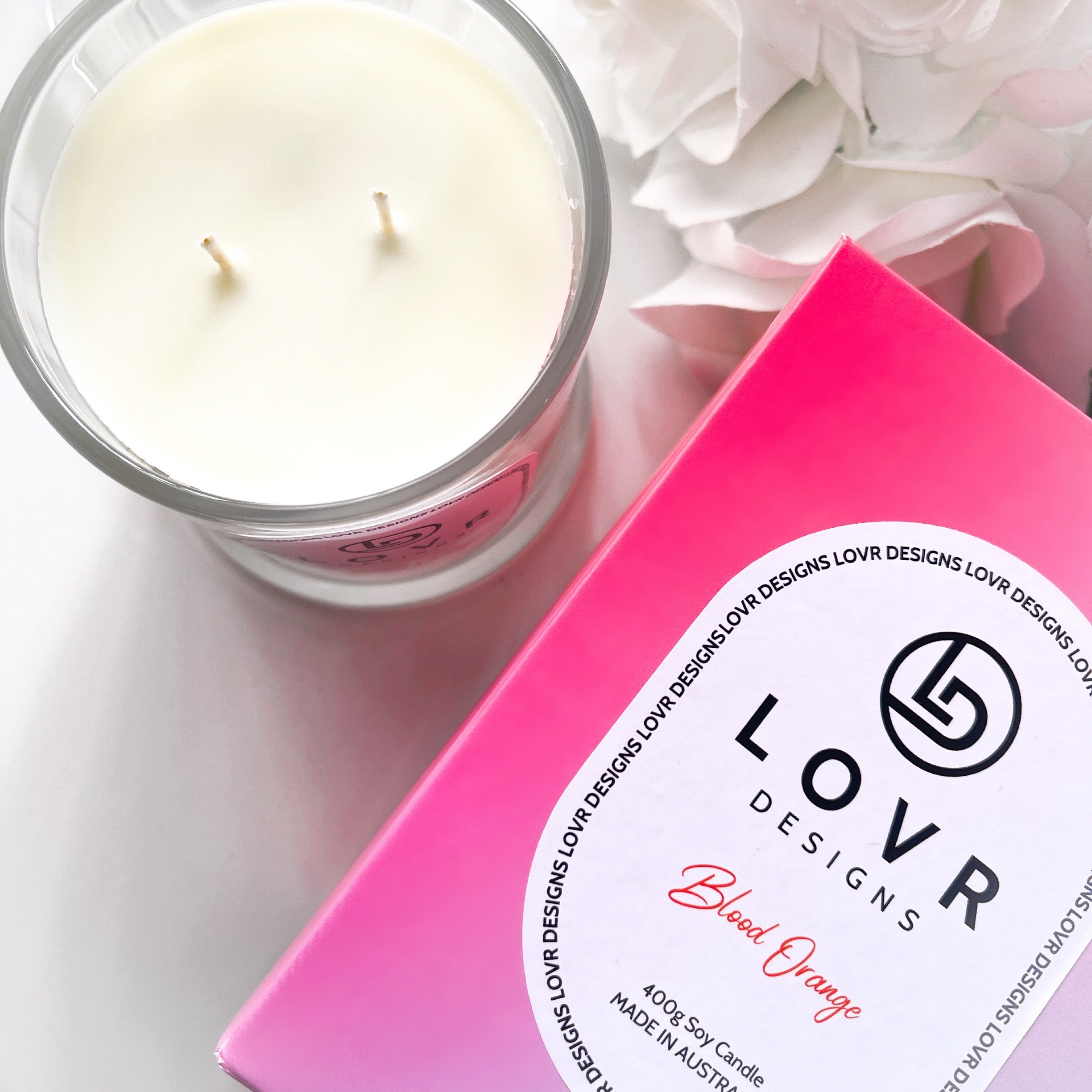 Blood Orange 400g soy candle and pink ombré gift box from Lovr Designs styled with white florals.