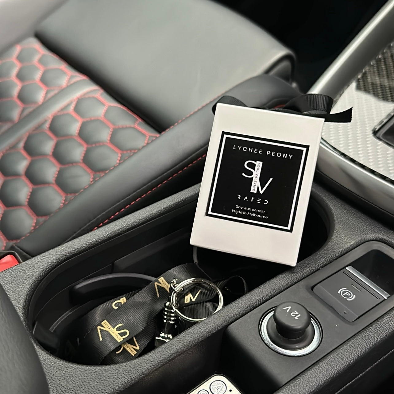 Luxury 60g branded candle in car console for Soul Valeting, Lychee Peony scent